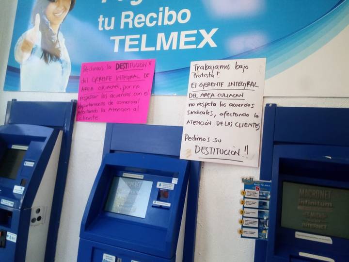 Protestan empleados de Telmex con cartulinas en su centro de trabajo (Sinaloa)